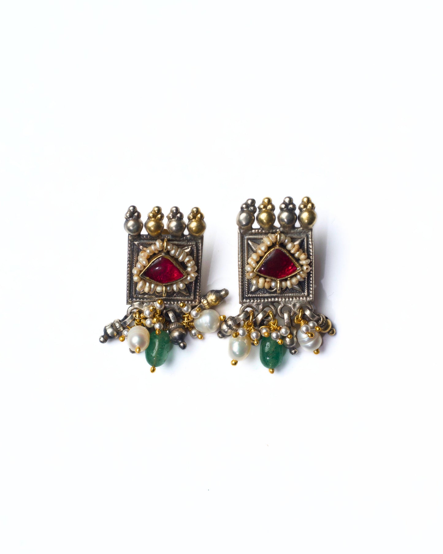 Square framed fusion silver stud earrings in 925 silver with deep red stone, pearl detailing, oxidised finish, and subtle gold-polished accents.