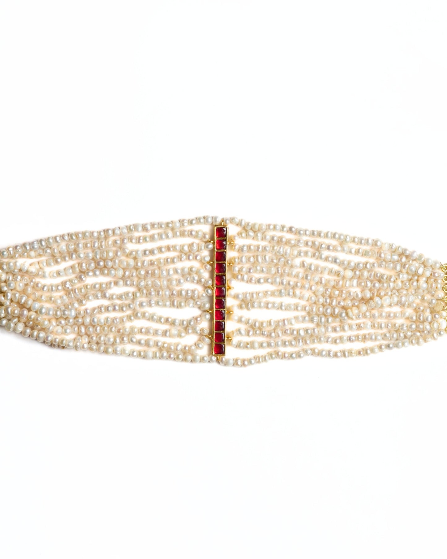 Multi-strand pearl choker in 925 silver featuring a vertical ruby-toned stone bar centre detail