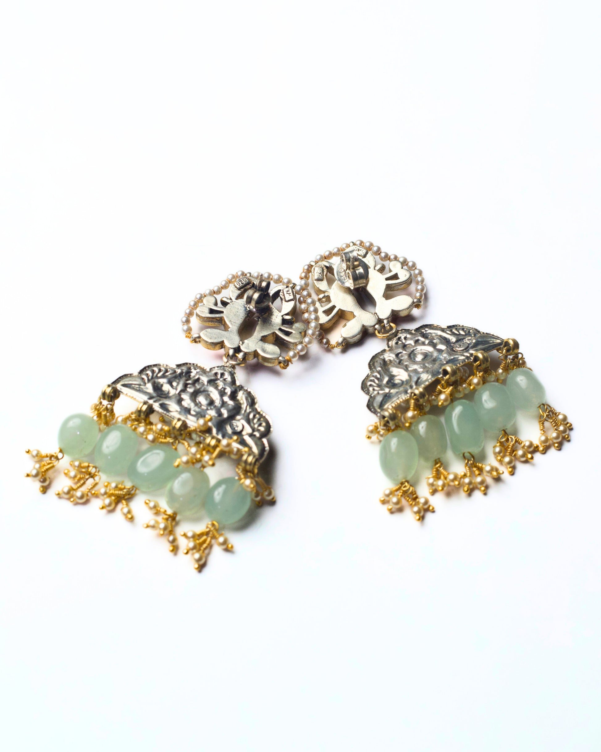 Naksa Aviary Fringe Earrings showcasing bird motifs, oxidised silver, gold-polished accents, and pearl fringe detailing
