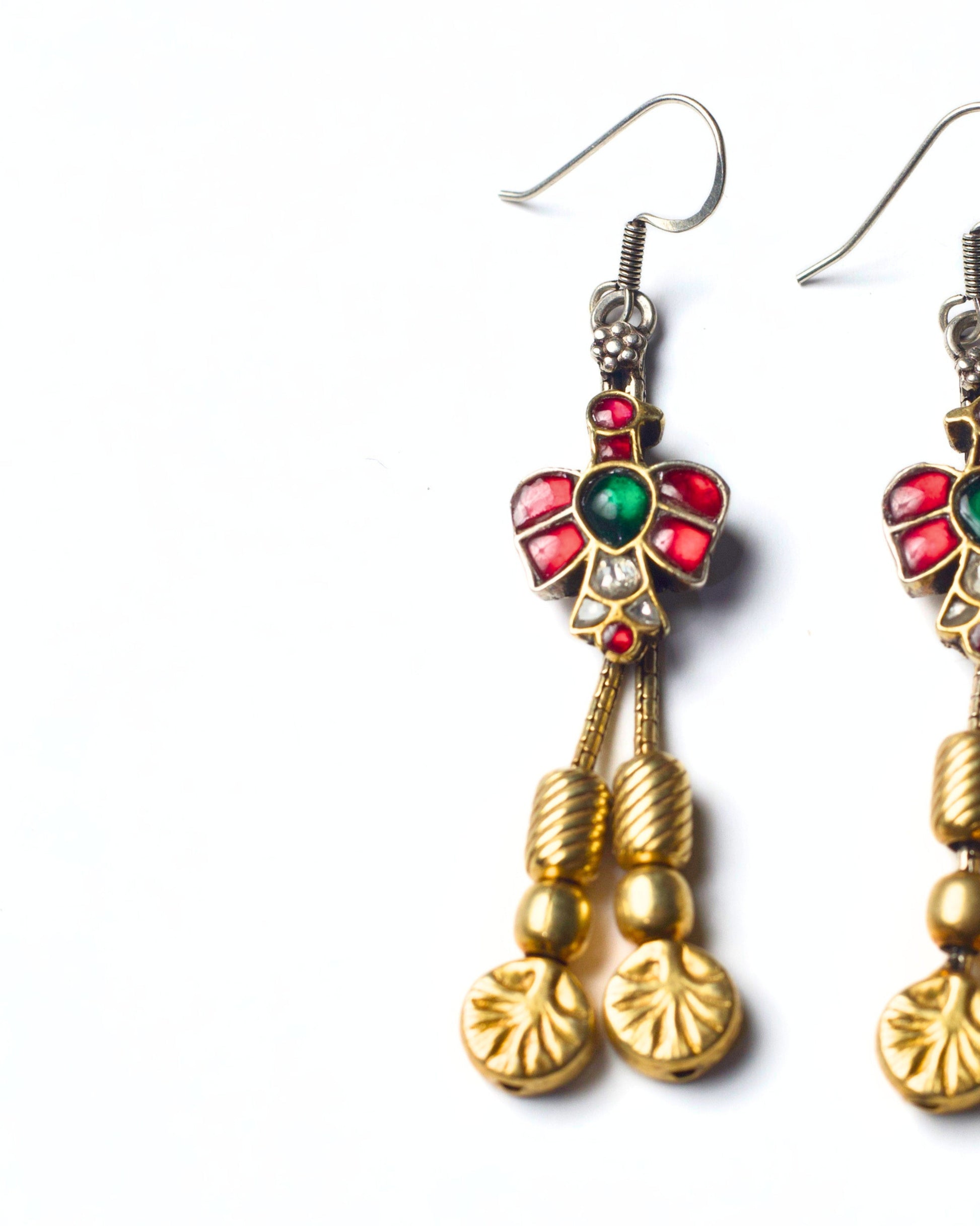 Fishhook Petal Bud Drops handcrafted in 925 silver with gold-polished floral motif and delicate hanging drops in red and green stones