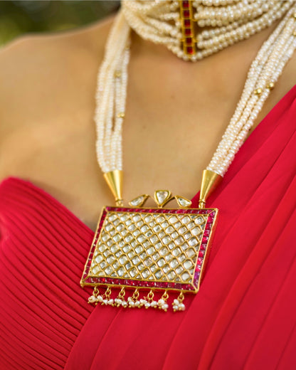 Statement pearl necklace with ruby border grid pendant and gold-polished silver detailing