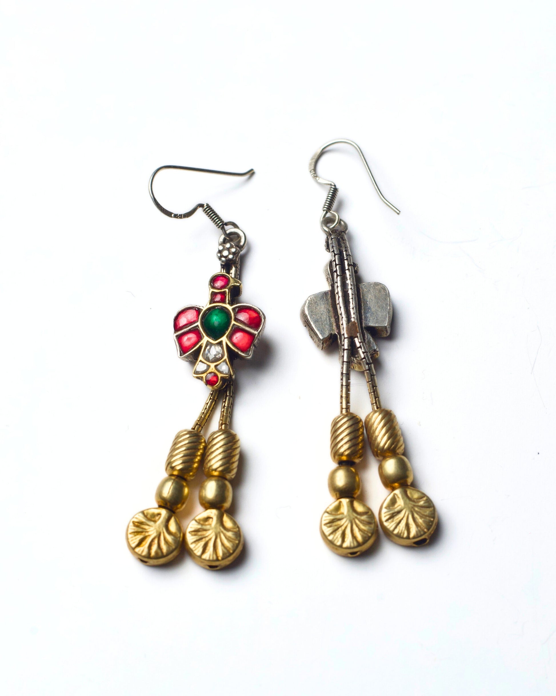 Back and front of Handcrafted 925 silver Petal Bud Drops featuring a pink bird motif, floral detailing, and gold-polished hanging drops with red and green stones