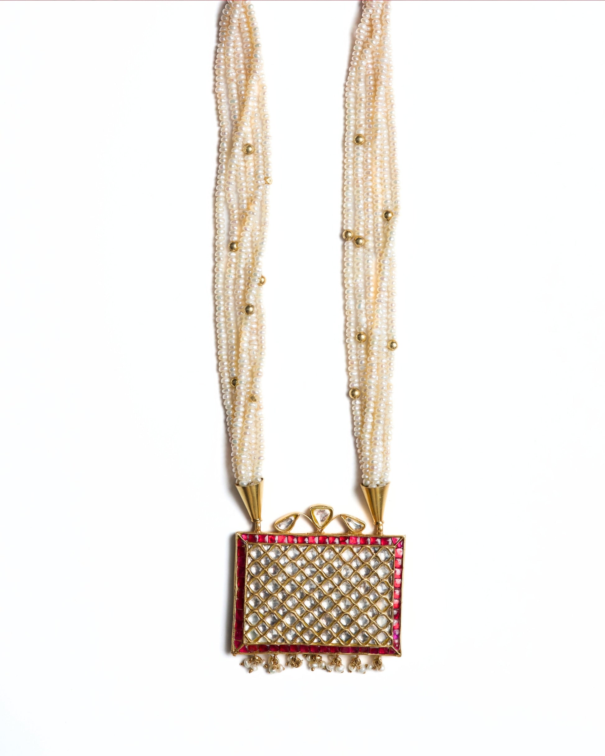 Layered pearl mala with bold rectangular kundan centre and ruby accents