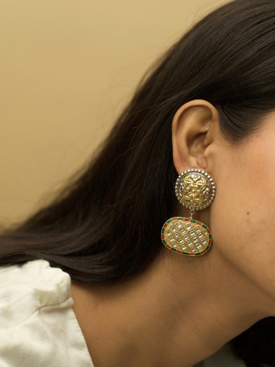 925 silver Surya Rekha Earrings with gold polish, two-tone carvings, and orange Kundan drops – Naksa heritage jewelry