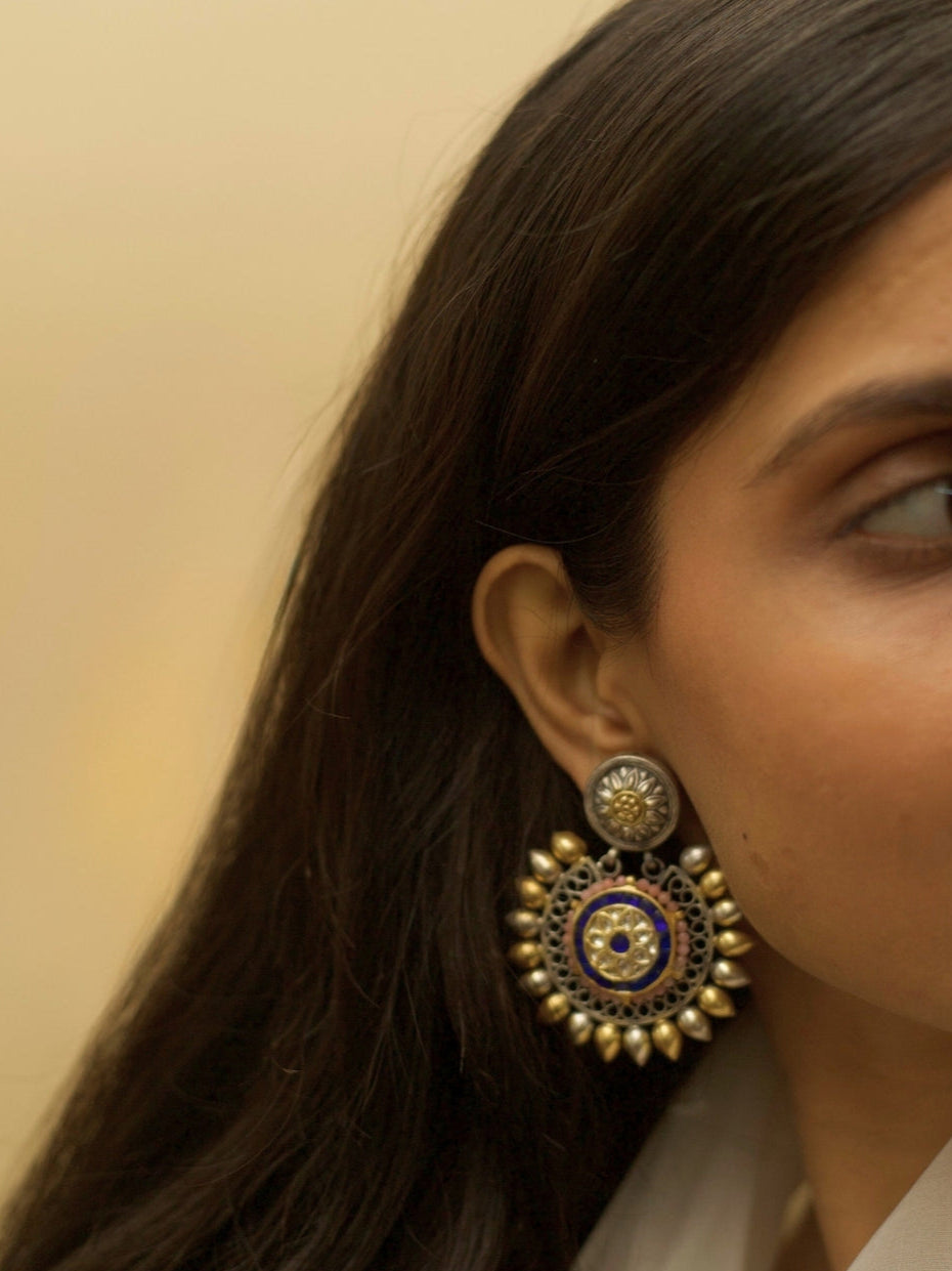 Naksa 925 silver Udaya Tara Earrings with gold-silver polish, festive blue stones, and pearl detailing – sun-inspired heritage design