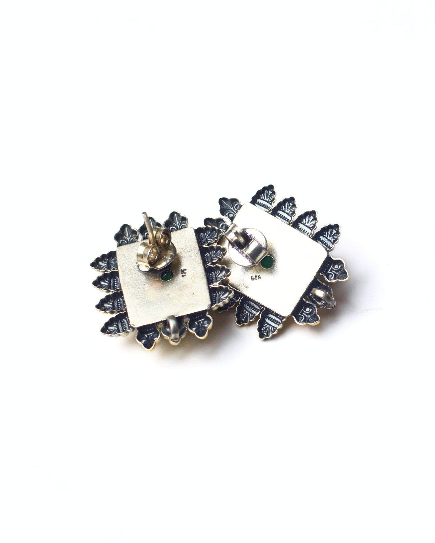 Back view of The Green Throne Studs showing a solid silver base with secure stud backing and handcrafted detailing.