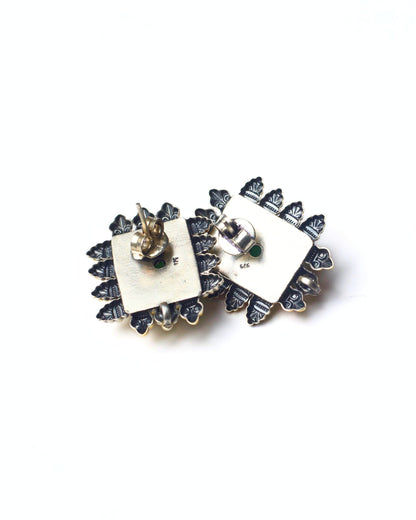 Back view of The Green Throne Studs showing a solid silver base with secure stud backing and handcrafted detailing.