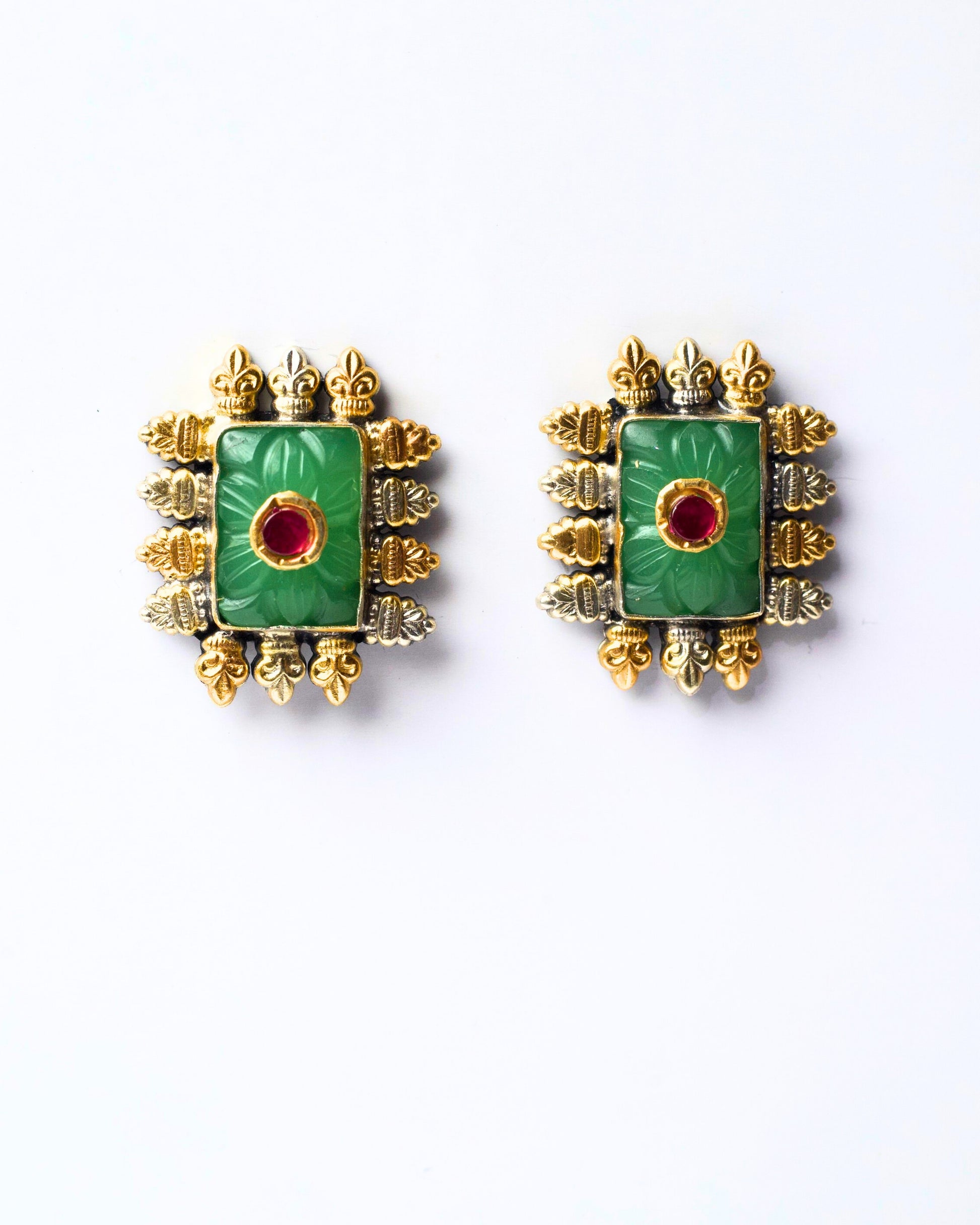 Front view of The Green Throne Studs featuring a deep green centre stone framed by sculpted silver and gold-toned detailing in a regal fusion design.