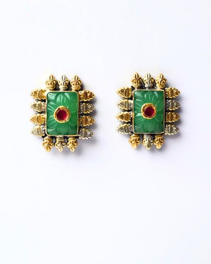 Front view of The Green Throne Studs featuring a deep green centre stone framed by sculpted silver and gold-toned detailing in a regal fusion design.