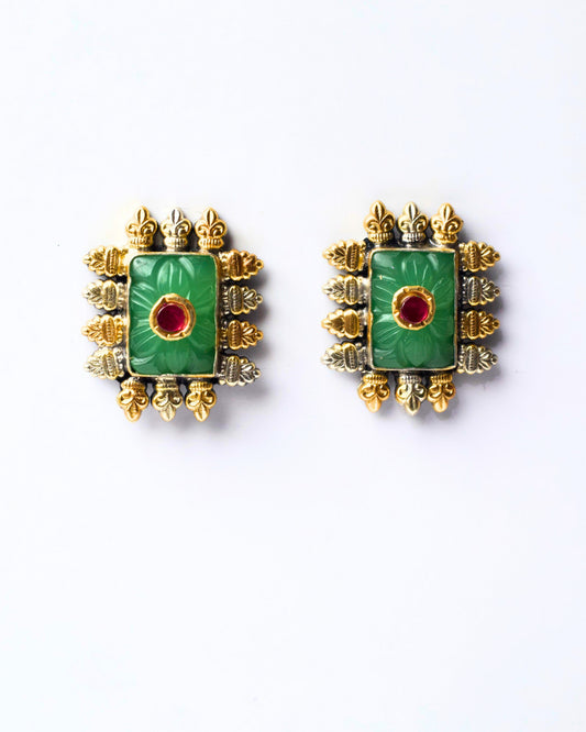 Front view of The Green Throne Studs featuring a deep green centre stone framed by sculpted silver and gold-toned detailing in a regal fusion design.