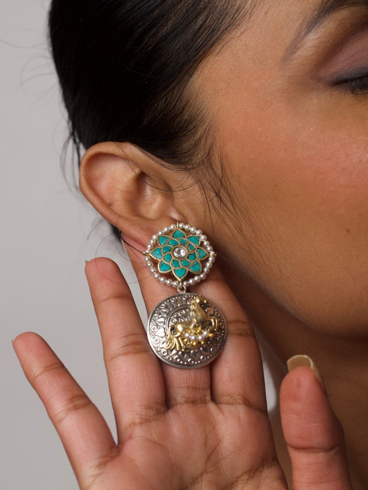 Close-up of Turquoise Trotters Earrings — silver horse motif drop with turquoise enamel floral top and pearl accents, handcrafted in 92.5 silver