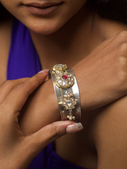 Close-up of Mirror of the Maharani Bracelet in pure 92.5 silver with kundan-style floral motifs, gold accents, and intricate detailing.